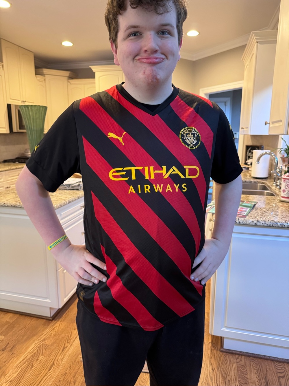 Puma Etihad Airways Black & Red Diagonal Stripe Soccer Jersey with Yellow Logos